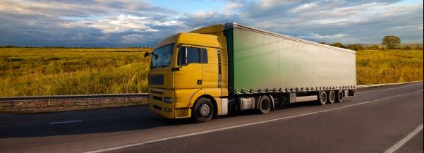 Truck riding on countryside road